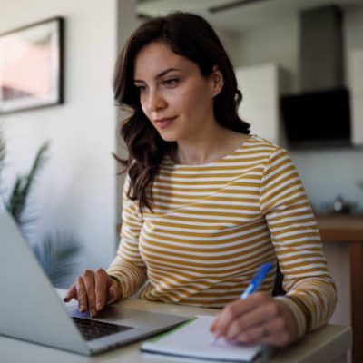 Young woman working at home